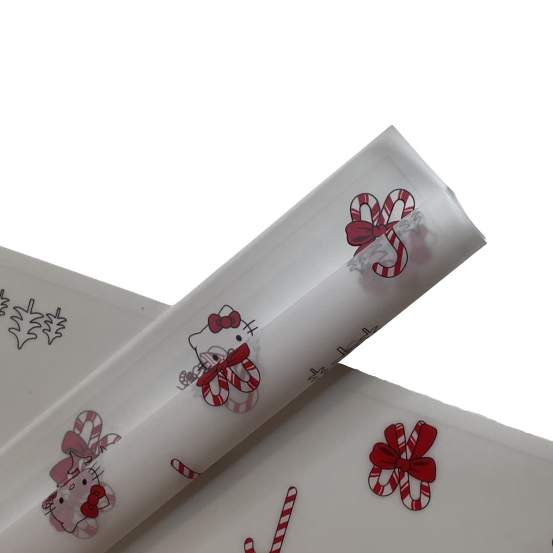 Papel de regalo floral de Hello Kitty con diseño de bastón de caramelo
