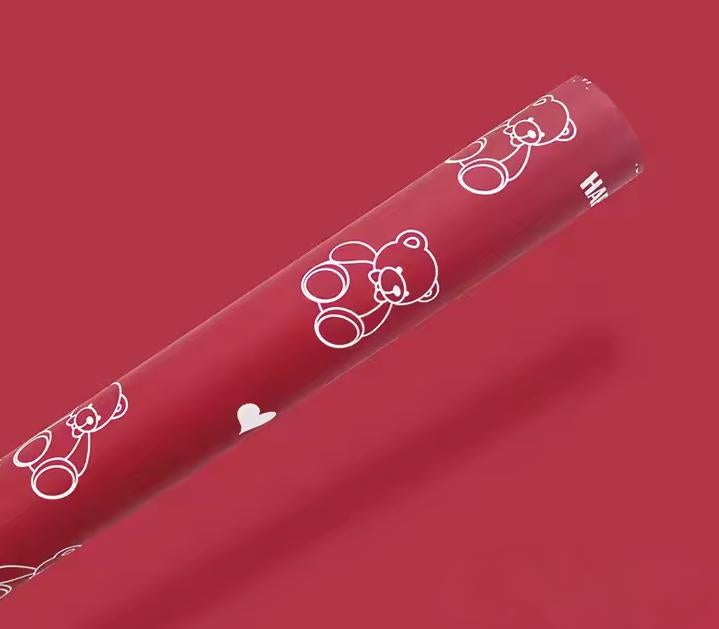 Papel de regalo floral con forma de osito de peluche